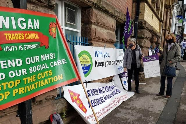 Retired members Shirley Skinley and Joan Harrison on the picket line in 2020