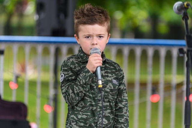 A young boy performs Crowds enjoying the entertainment on offer at the Mayor's Jubilee Gala in Pennington Hall Park, Leigh. Photo: Kelvin Stuttard