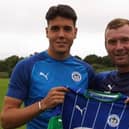 Jack Sanders with his Latics Academy coach Nick Chadwick