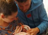 Lisha Tarbuck and Cameron Downs with daughter Myla-Rae Downs