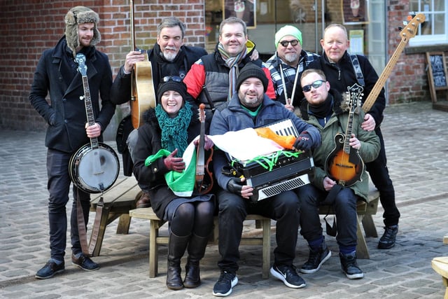 2018: Band 'Beware Of The Pig' get ready to entertain visitors, part of  the St Patrick's Day events at Haigh Woodland Park, Wigan