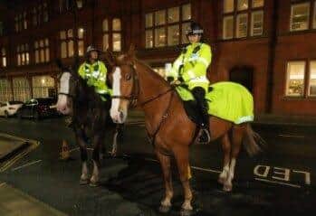 Police horses in Wigan town centre