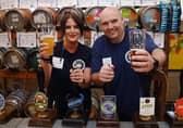 A flashback to the 2023 Ashton Beer and Cider Festival. With hands on pumps are Emma Martin and Kev Smith