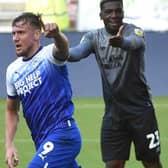 Charlie Wyke celebrates his goal for Latics against Cardiff