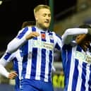 Martial Godo gave Wigan an early lead against Peterborough