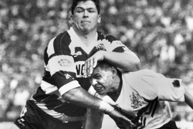 Andy Farrell gets to grips with David Hulme after coming on as a substitute and became the youngest player, aged 17, to win a Challenge Cup Final.