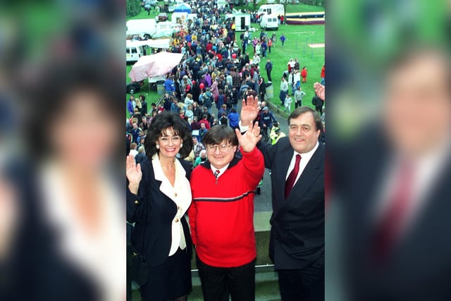 Deputy PM John Prescott his wife Pauline and Ian McCartney give a wave on the balcony ay The May day rally at Haigh Hall