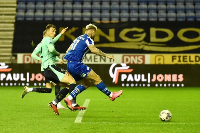 Shining light for his side, scored one, made another and dragged Latics back from the brink
