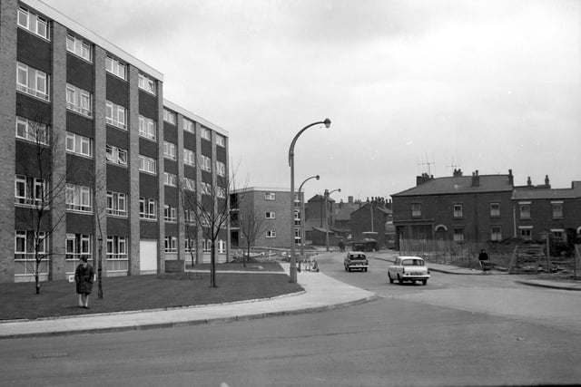 Retro 1966 - Newly built maisonettes in Scholes contrast the run down terraces opposite
