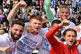 Graeme Shinnie (far left)