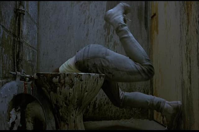 Ewan McGregor takes a dive in the infamous Trainspotting dream sequence
