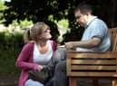 A person with autism and his carer