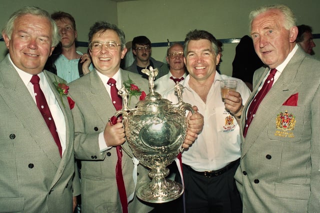 Wigan coach John Monie shares the glory with directors Tom Rathbone, Jack Robinson and Jack Hilton after Wigan beat Widnes 20-14 in the Challenge Cup Final at Wembley on Saturday 1st of May 1993.