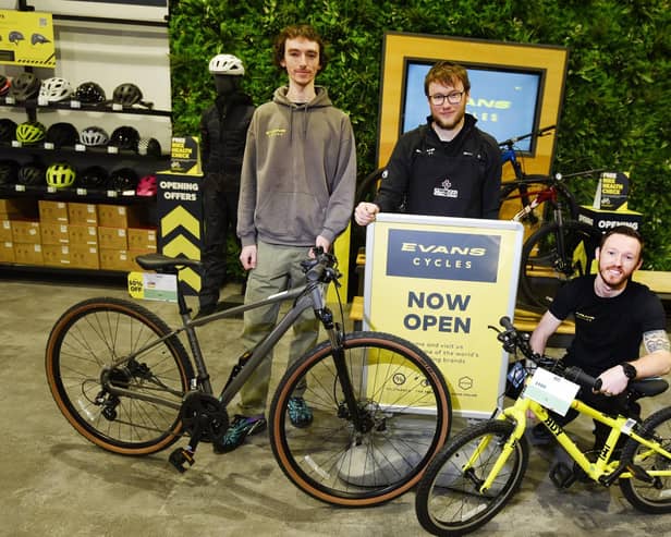 From left, Store manager Joel Desmond, Will Parrett and Luke Berry, at Evans Cycles, the newest arrival at Robin Retail Park, Wigan.