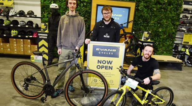 From left, Store manager Joel Desmond, Will Parrett and Luke Berry, at Evans Cycles, the newest arrival at Robin Retail Park, Wigan.