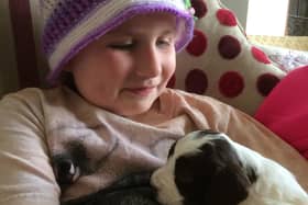 Hope Colley with puppy Pippa, who has since become a therapy dog