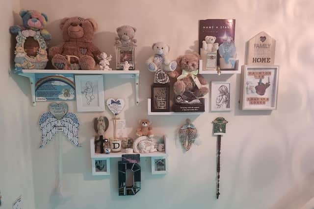 The 'memory wall' at Sarah Lou's home, to remember her son, Dainton.