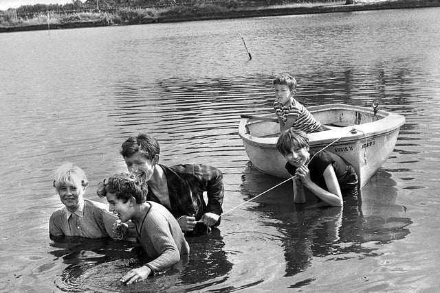 Summer fun on Wrightington fishponds in the 1960s.
