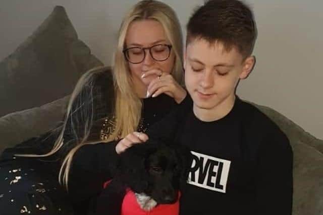Cheryl and Declan Malone with Rosie back home after she was rushed to the vet's choking on chewing gum