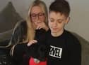 Cheryl and Declan Malone with Rosie back home after she was rushed to the vet's choking on chewing gum