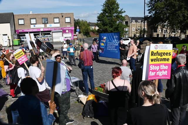 A counter-protest was held by Wigan Stand Up to Racism.