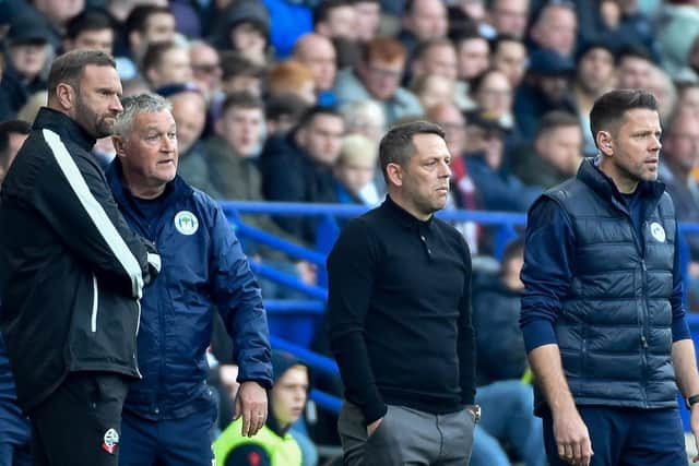Ian Evatt watches on with the Latics bench during Bolton's 4-0 defeat in October