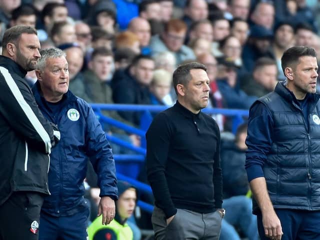 Ian Evatt watches on with the Latics bench during Bolton's 4-0 defeat in October