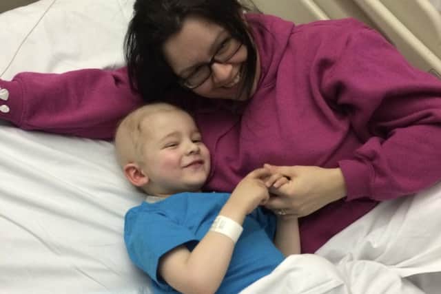 Josh Cubbin was diagnosed with an aggressive form of cancer when he was three years old. He is pictured during his treatment with mum Jane.