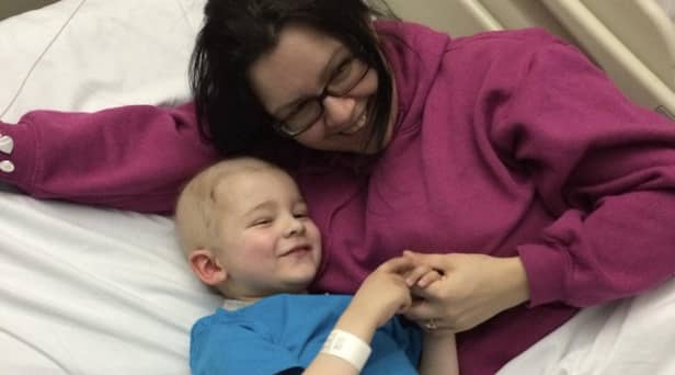 Josh Cubbin was diagnosed with an aggressive form of cancer when he was three years old. He is pictured during his treatment with mum Jane.