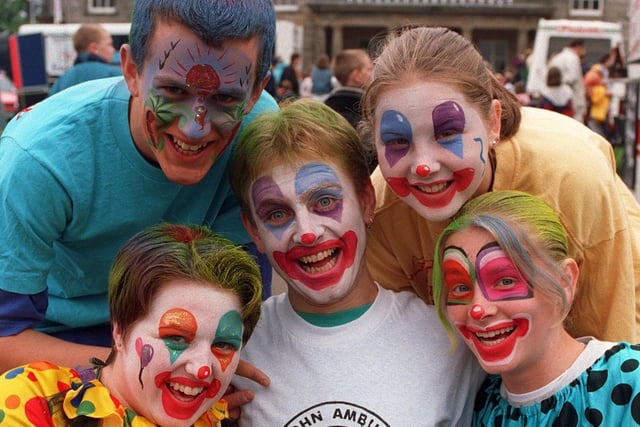 Some of the colourful chracters, from "Let's Party", fundraising by face painting, for the St John Ambulance, at their Greater Mancheter 1997 Year For Youth Birthday Extravaganza, held at Haigh Hall.