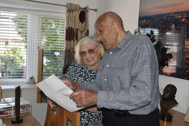 Billy Boston, pictured with wife Joan, as he learned he would be knighted
