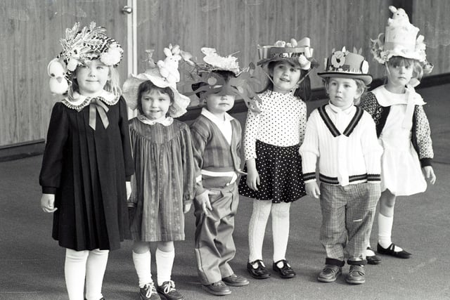 RETRO 1980s  - An Easter bonnet parade for these Wigan primary school pupils
