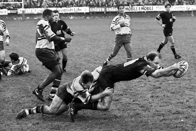 Orrell full-back Simon Langford dives over for his try in the Pilkington Cup round 5 match at Edge Hall Road on 28th of January 1995. 
Orrell lost 19-25.