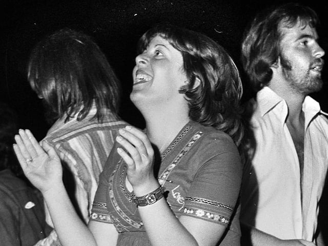 Folk fans enjoying dancing at the 1977 July Wakes Folk Festival at Park Hall, Charnock Richard.
