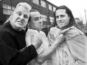 American wrestling superstars the Nasty Boys, Brian Nobbs, left, and World Heavy Weight Champion Brett "Hitman" Hart, right, get to grips with the original British Bulldog, Tommy Billington, outside his house in Douglas Way, Platt Bridge, on Monday 1st of February 1993.
The Nasty Boys were in Manchester for the start of their World Wrestling Federation promotional tour and stopped off in Platt Bridge to meet up again with their battling British buddy and former champion Tommy who was part of the British Bulldog tag team along with his cousin, Golborne man, Davey Boy Smith, who was a wrestling megastar in the States.