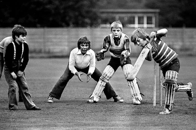 Young lads during cricket practise at Wigan Cricket Club, Bull Hey, in September 1973. 