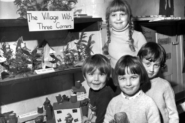 Helping to make a model village are Alan Benton, Angela Gaskell, Emma Spencer and Susanne Eastham at Shevington Primary School in November 1976.