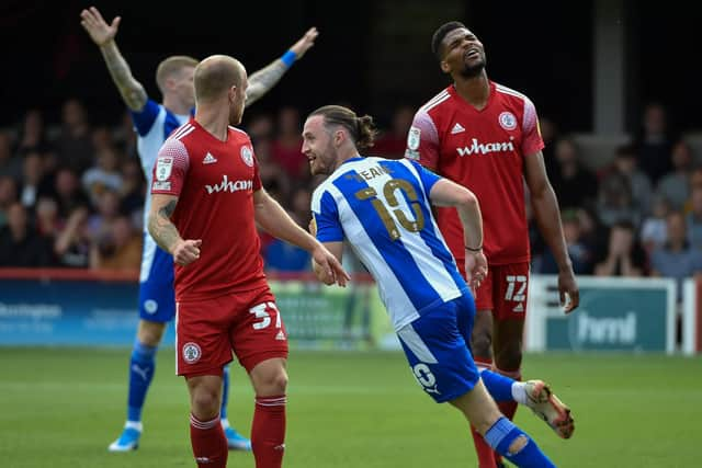 Will Keane celebrates another goal for Latics