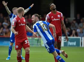 Will Keane celebrates another goal for Latics