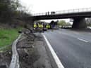 Dramatic photographs show the aftermath of a horror motorway crash which has left a lorry split in half.