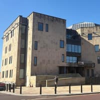 A young Wigan man accused of rape will only stand trial in almost three years' time