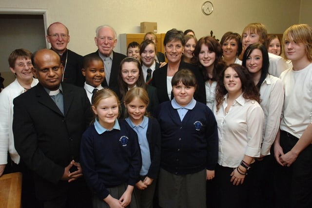 Pupils from St Mary and St John's Primary School, St John Fisher High School and St John Rigby College students at St Teresa's RC Church, Up Holland, before the CAFOD Carol Service with Bishop Tom Williams, parish priest Canon Joseph D'Arcy, guest speaker Fr Jeyakumar of HUDEC/Caritas Sri Lanka, who talked about his work following the tsunami, and Chris Lappine, from CAFOD