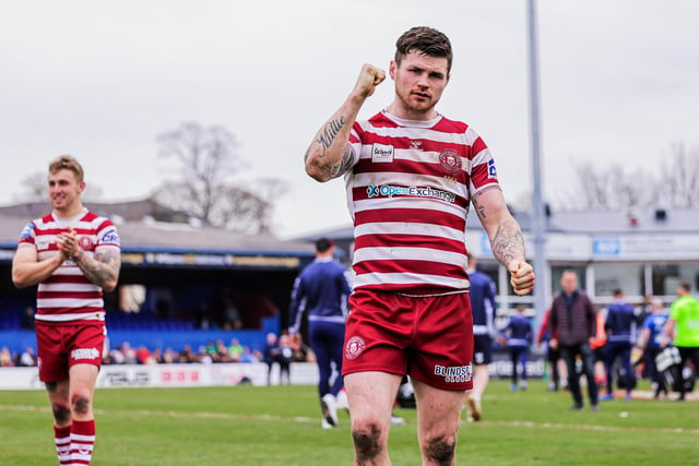John Bateman celebrates at full time, with victory setting up a semi-final tie with St Helens.