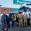 Poundland store manager Georgie Pugh, deputy Denise Gilligan, transport shift manager Darren Pye and driver Ian Marsh join soldiers from 32 Engineers and 5 Royal Artillery with one of three Poundland trucks wrapped for Remembrance Day outside the store in Catterick.