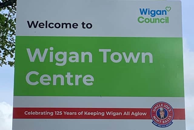 One of the Wigan Council signs bearing the Uncle Joe's anniversary logo