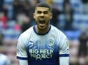 Ashley Fletcher celebrates his equalising goal for Latics against Birmingham