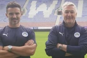 Goalkeeping coach Darryl Flahavan and assistant manager Rob Kelly have left Latics