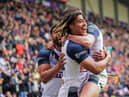 Dom Young went over for a try in England's win at the DW Stadium