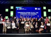 All award recipients on stage
