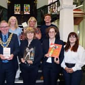 The Mayor of Wigan Coun Kevin Anderson and Mayoress Samantha Lloyd, chief execultive of Wigan Council Alison McKenzie-Folan with other Wigan Council members, welcome some of the members of the Angers Twinning delegation and exchange books in a ceremony at Wigan Town Hall last summer